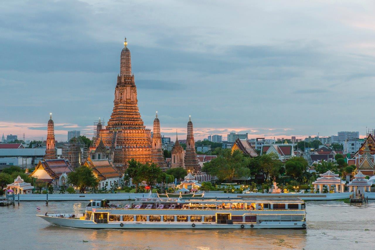 Wat Arun and cruise ship in night Bangkok